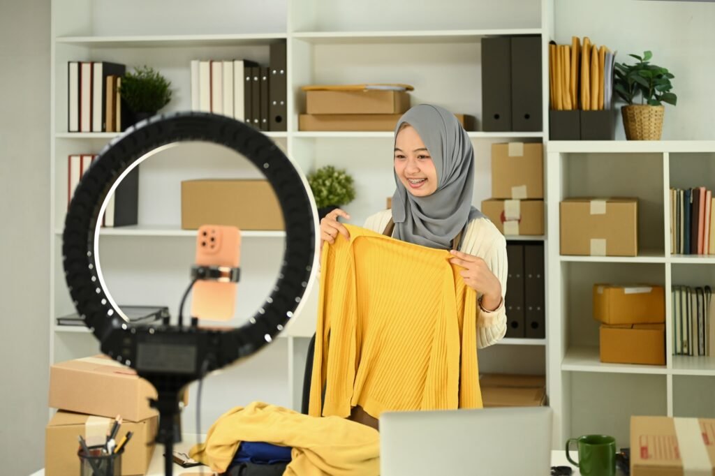 Young woman live streaming showcasing a product to her audience.